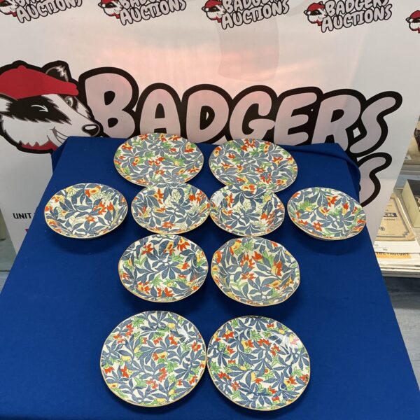 Vintage Royal Tudor Ware plates with colourful floral Fantasy pattern.