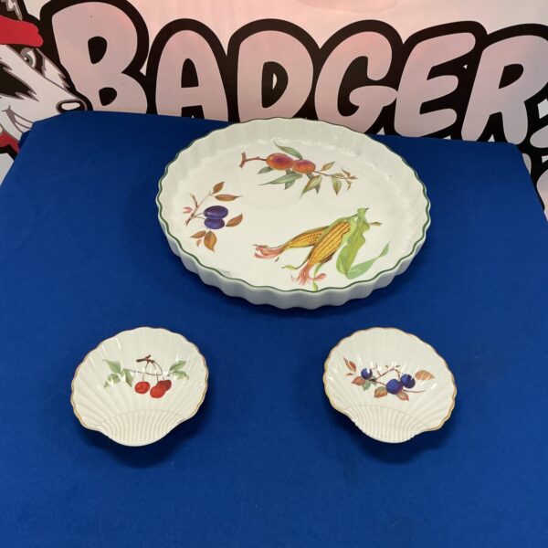 Antique Royal Worcester flan dish with floral decoration.