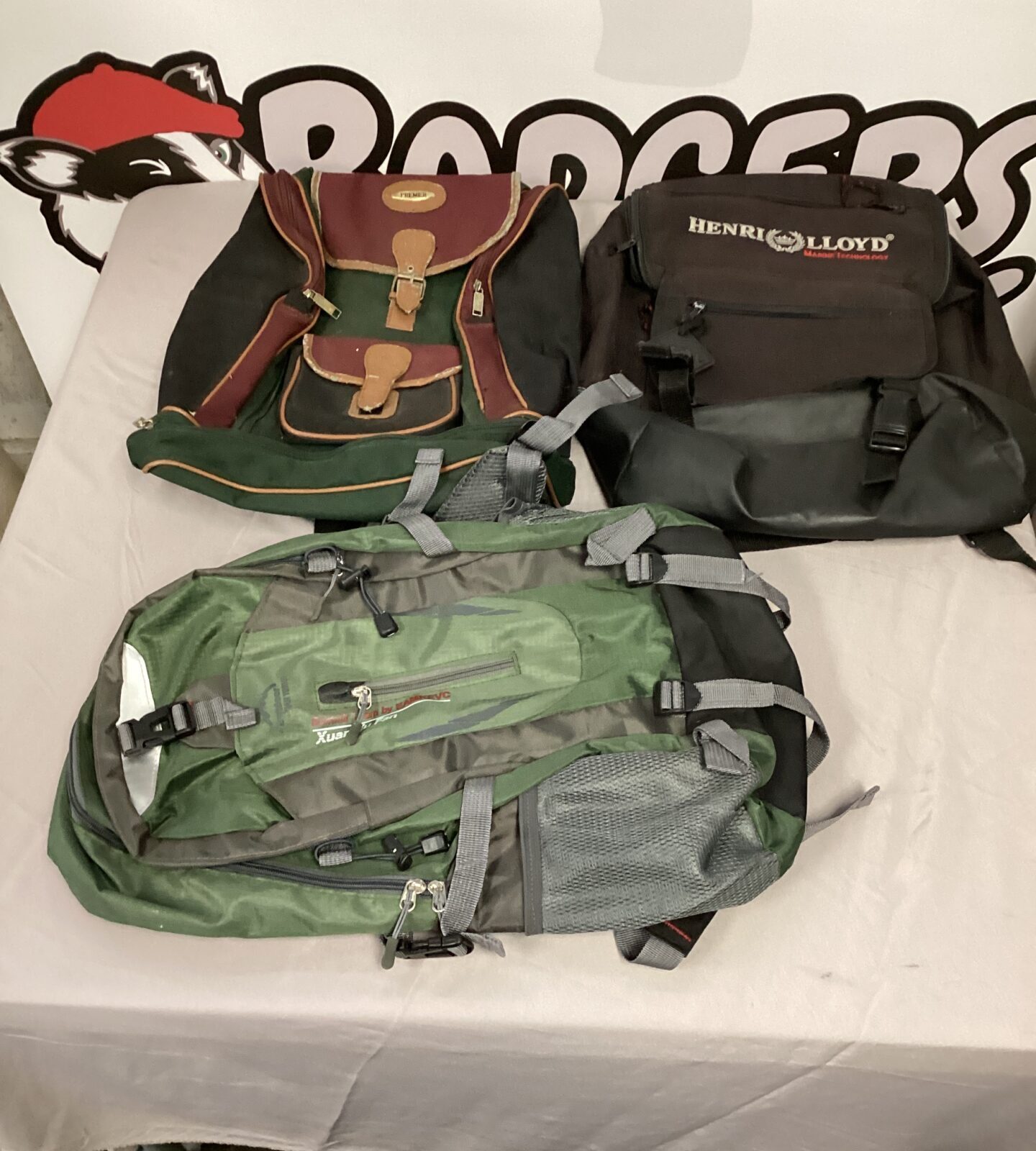 Rucksacks lot featuring Henri Lloyd and Premier backpacks for outdoor adventures.