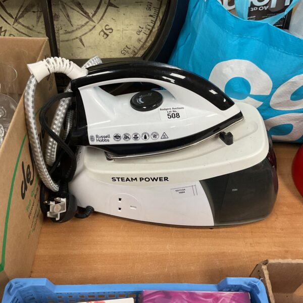 Vintage Russell Hobbs steam iron, a collectible household appliance.