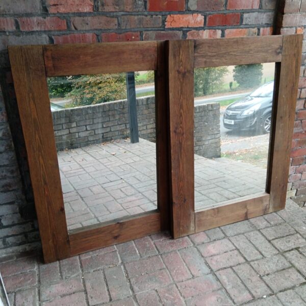 Pair of large rustic pine framed mirrors for farmhouse decor.