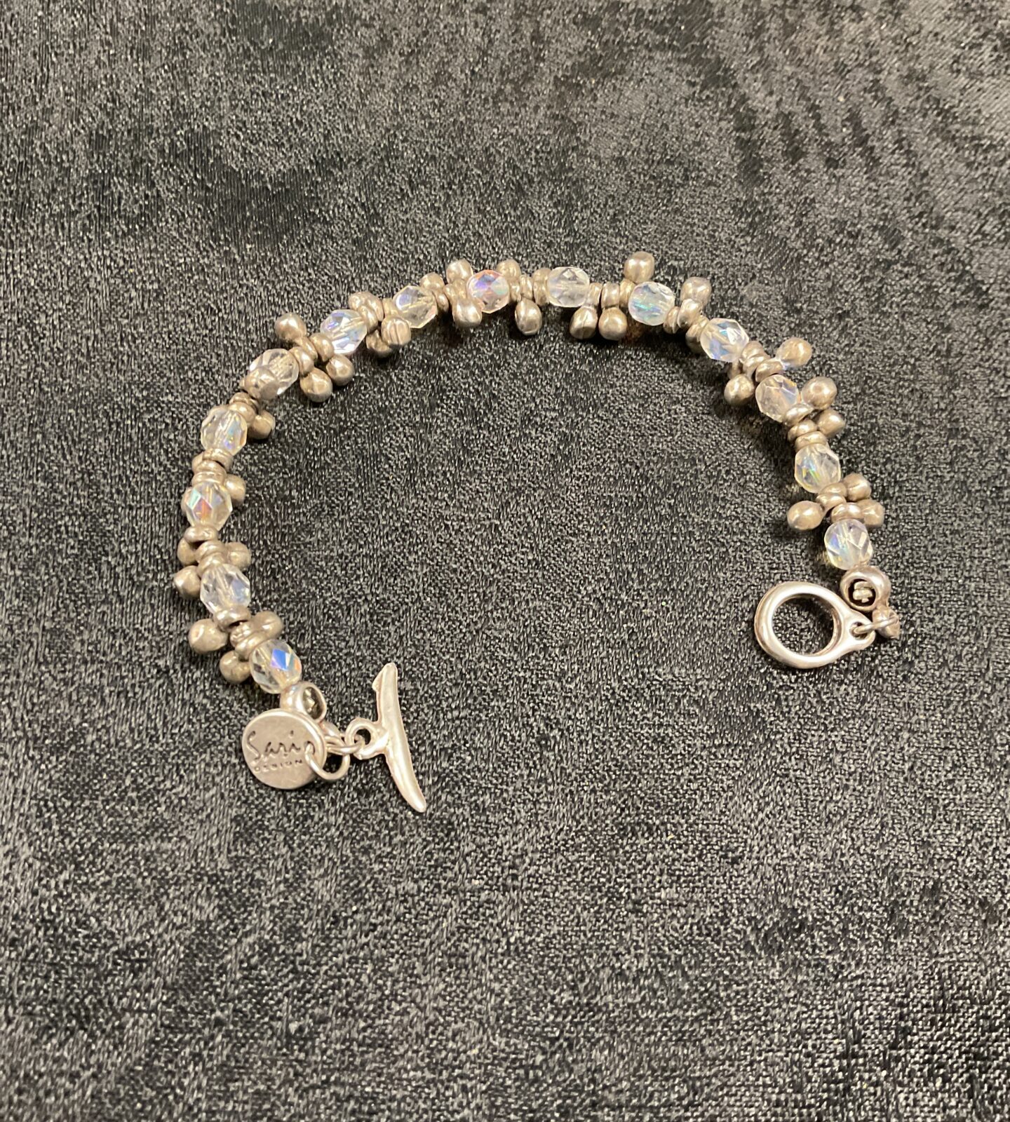 Close-up of a vintage sari crystal bracelet with clear crystals.