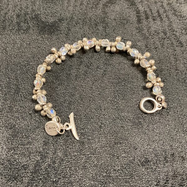 Close-up of a vintage sari crystal bracelet with clear crystals.