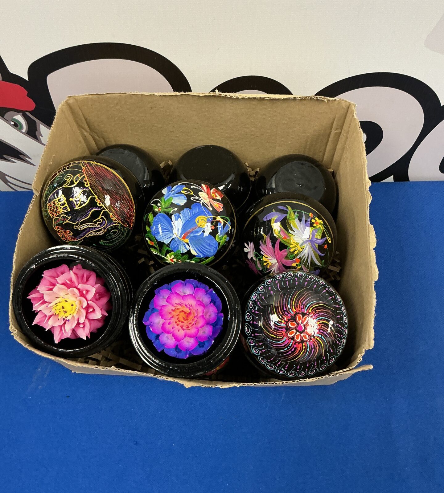 Vintage collection of scented wax flowers in clear cases.
