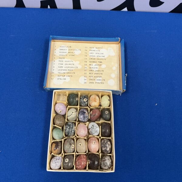 Polished semi-precious stone eggs in a collection.