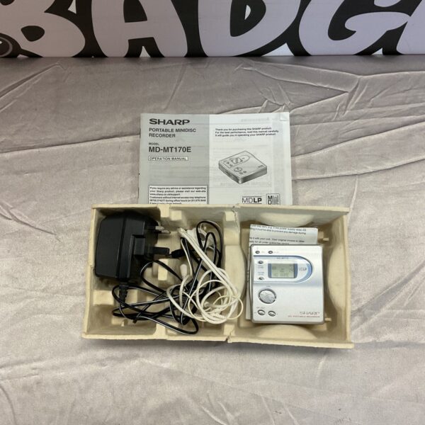 Black Sharp MT170E portable minidisc recorder, vintage audio device.
