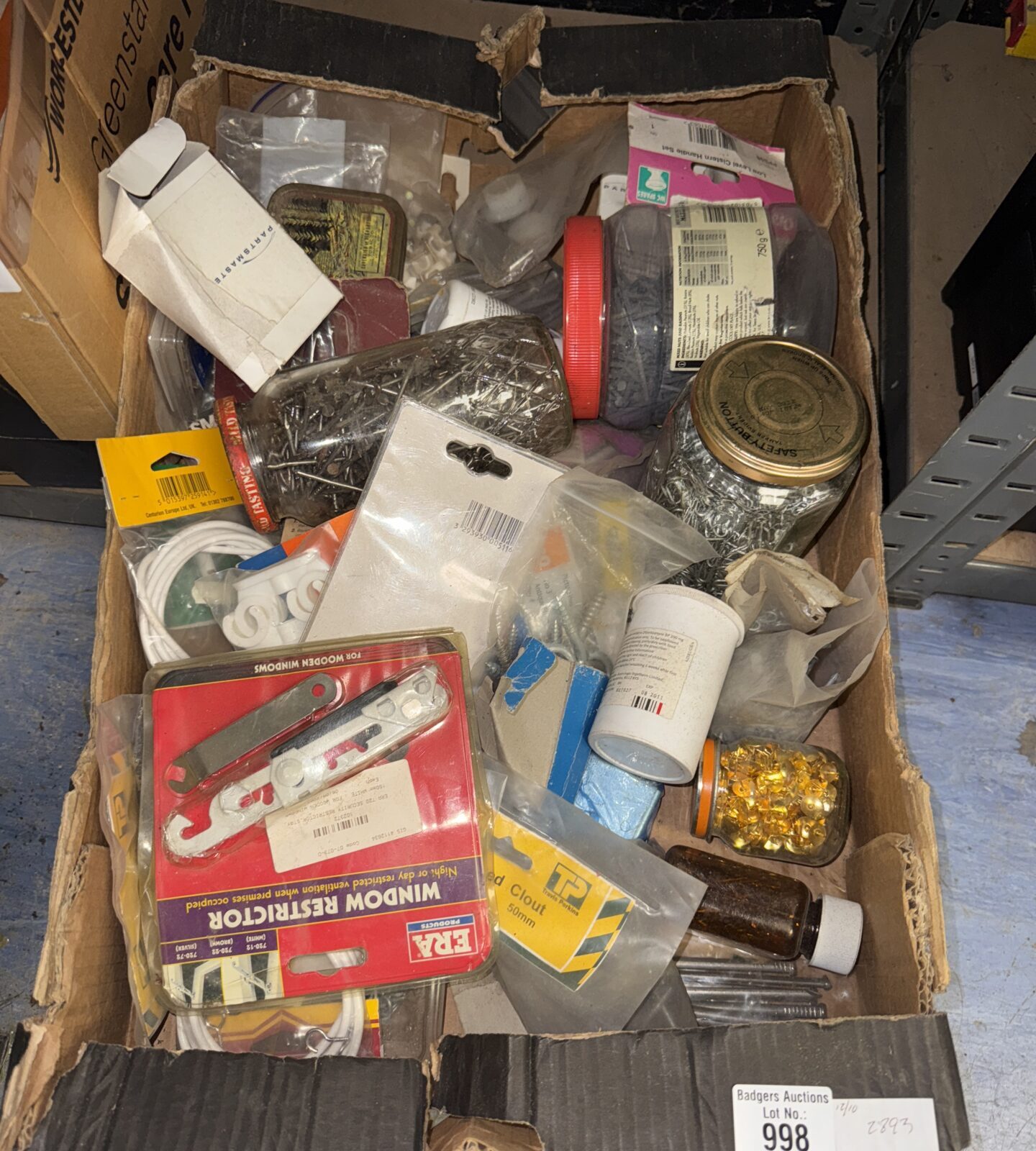 Mixed shed clearance lot with nails, tacks and hardware.