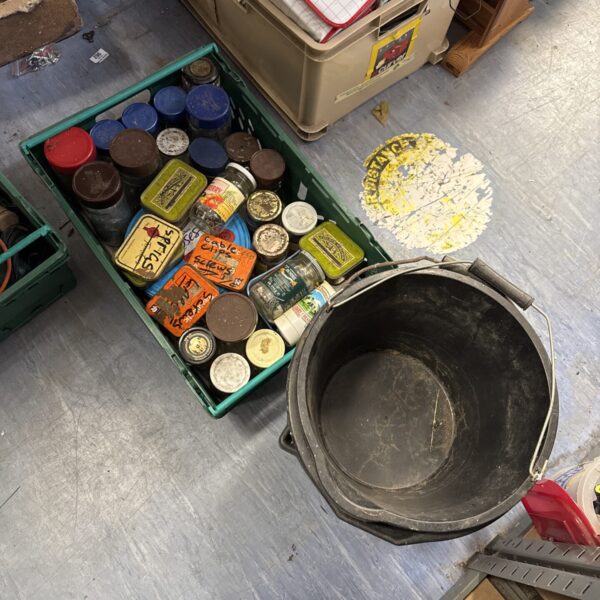 Shed clearance lot with screws, bolts and plastic buckets.