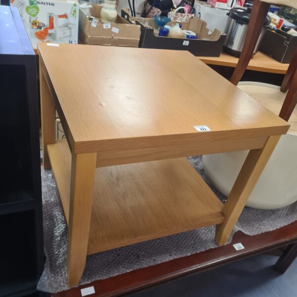 Light wood effect side table with a beach aesthetic.
