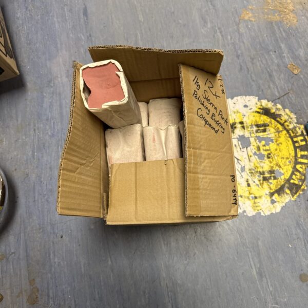 Stack of twelve 1kg Sierra Pink polishing compound bars.
