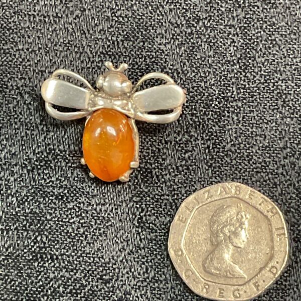 Vintage silver and amber bee brooch, detailed insect jewellery.