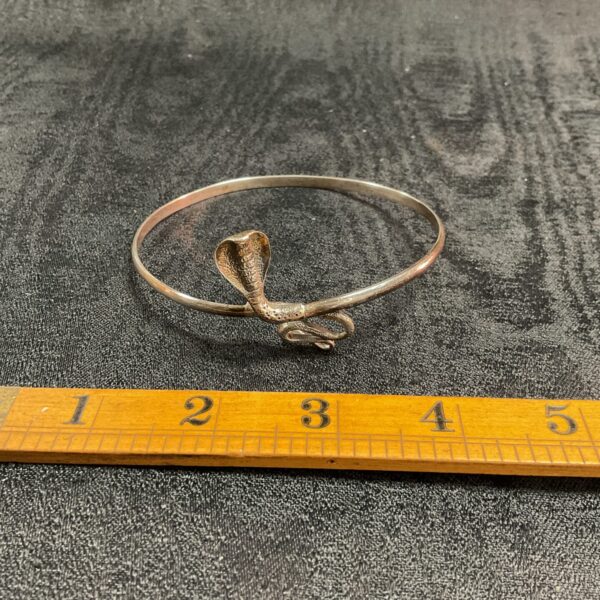 Detailed silver cobra snake bracelet, vintage armlet jewellery.
