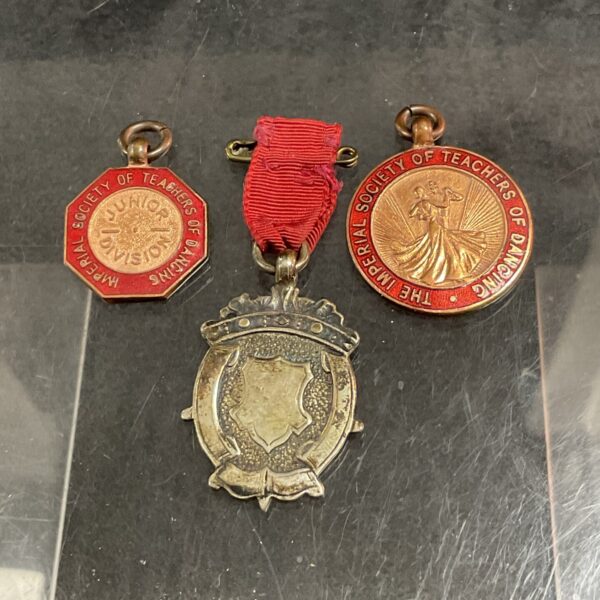 Vintage silver dance medal with delicate fob and ribbon.