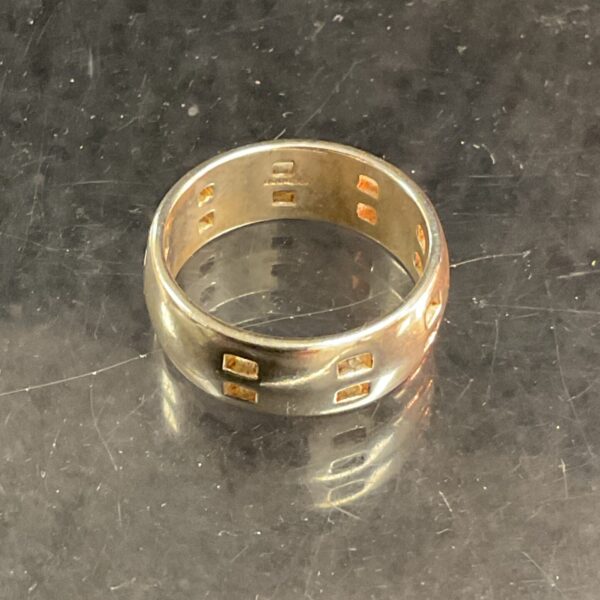 Hallmarked silver ring, size O, modern design.