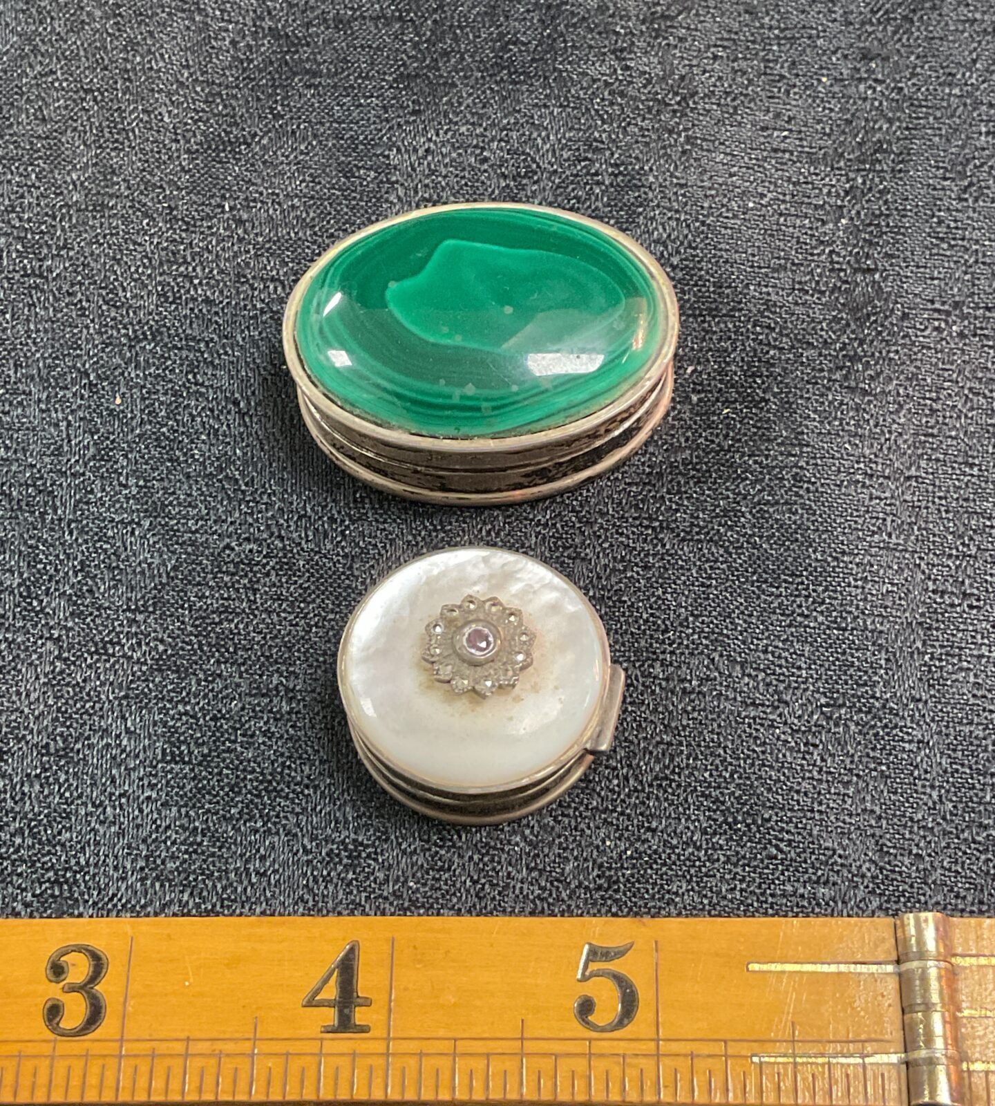 Vintage silver pill pot with malachite lid, collectible antique.