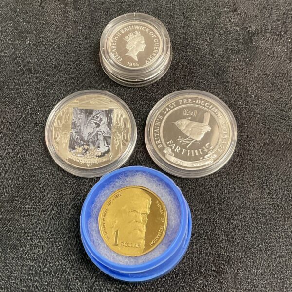 Silver proof coin collection featuring 1995 £1, Gibraltar and Australian coins.