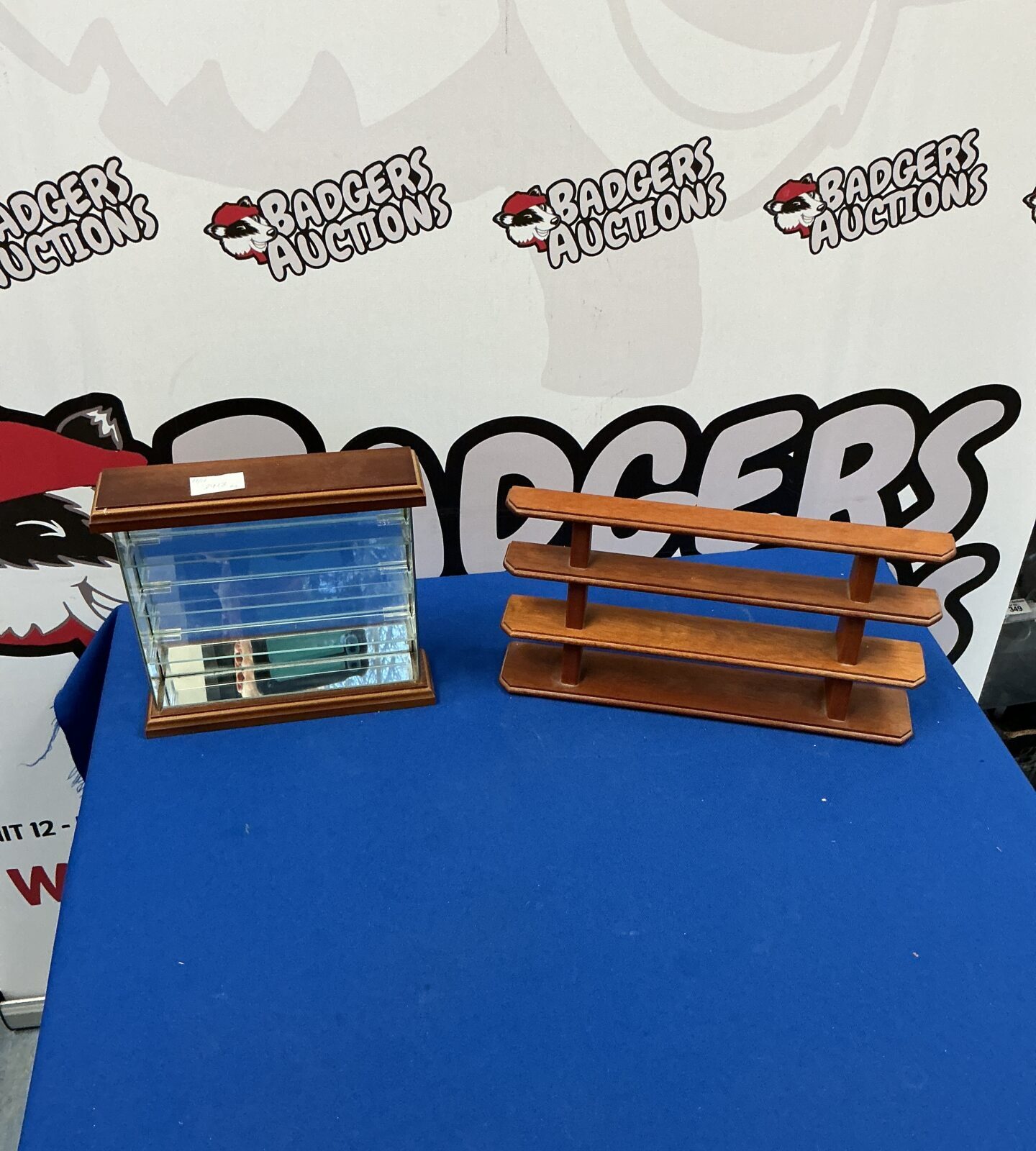 White miniature shelf units for displaying collectibles.