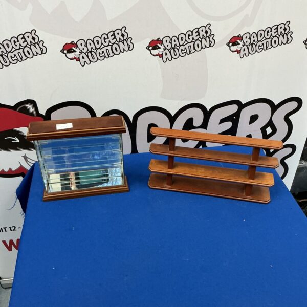 White miniature shelf units for displaying collectibles.