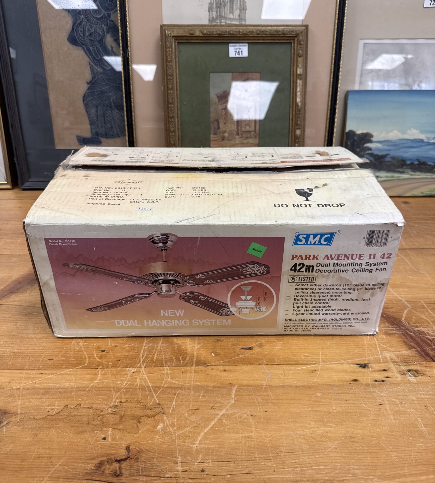 Front view of new-in-box SMC Park Avenue II ceiling fan.