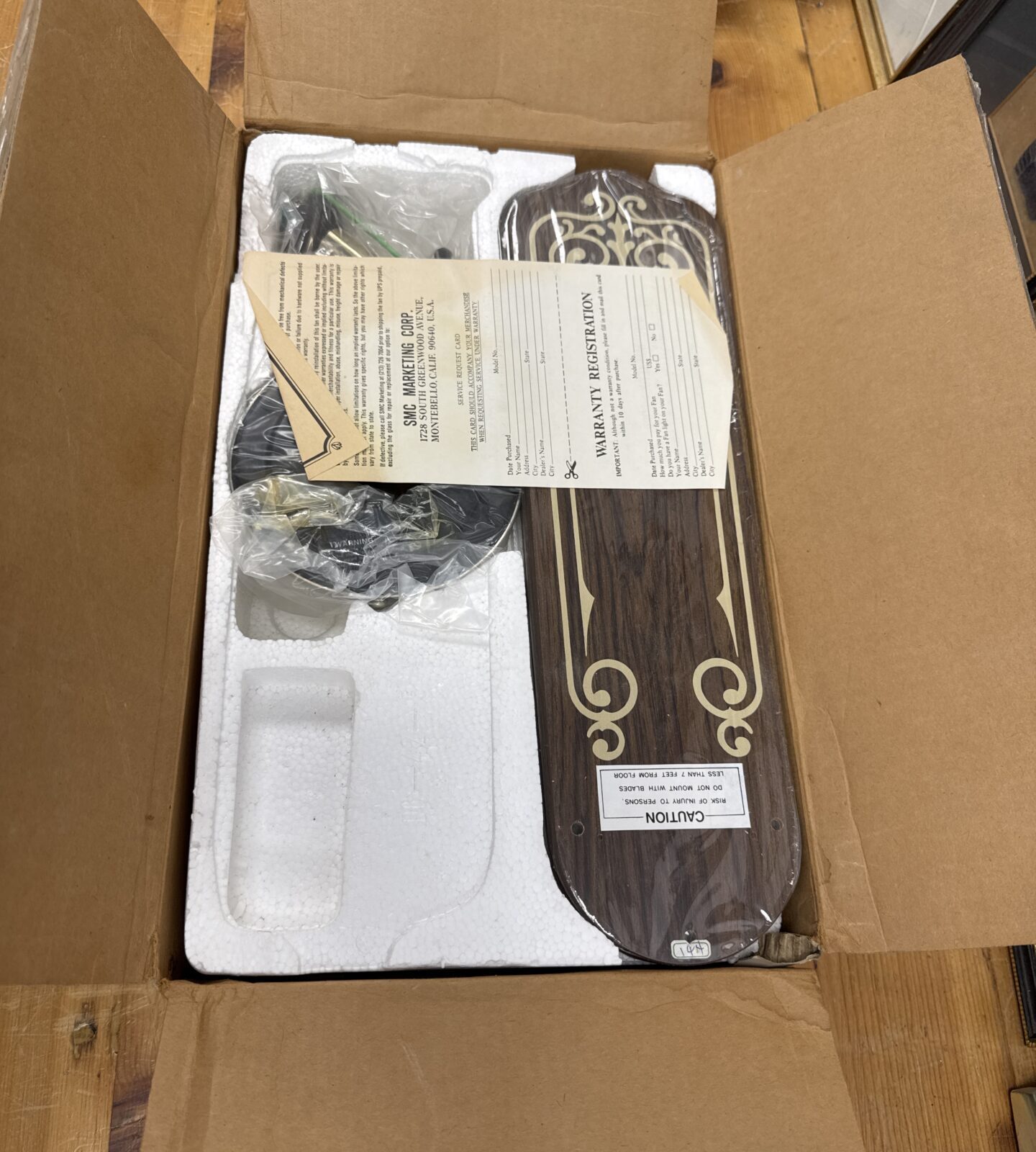 Side view of the SMC Park Avenue II ceiling fan box with details.