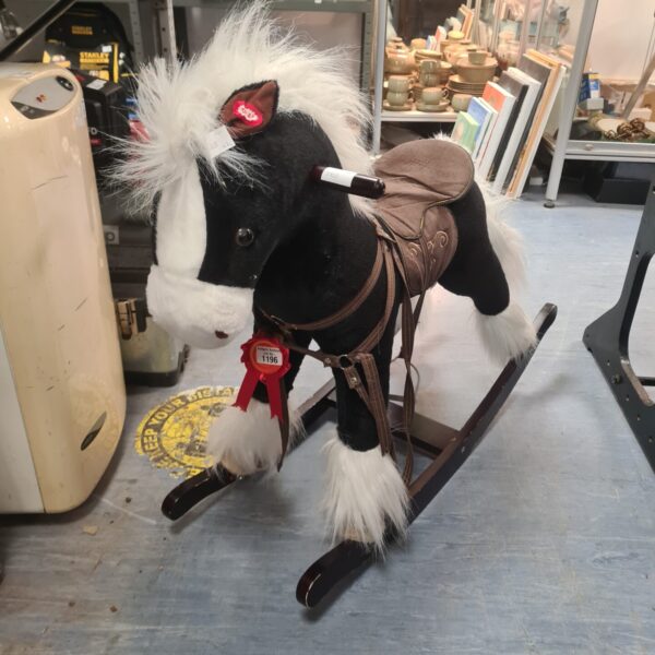 Classic Smyths Toys rocking horse for children's play.