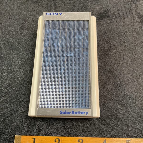 Vintage Sony BPT-36 solar battery on black surface.