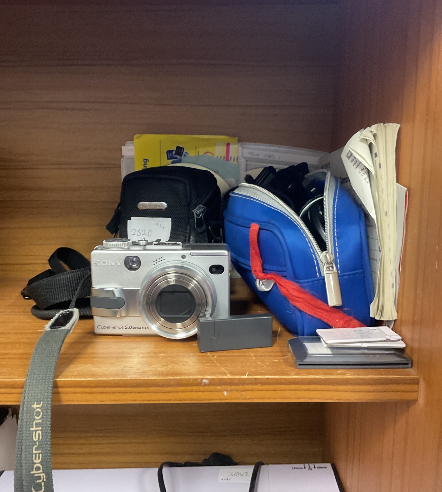 Sony Cyber-Shot digital camera with accessories, 5.0 megapixels.