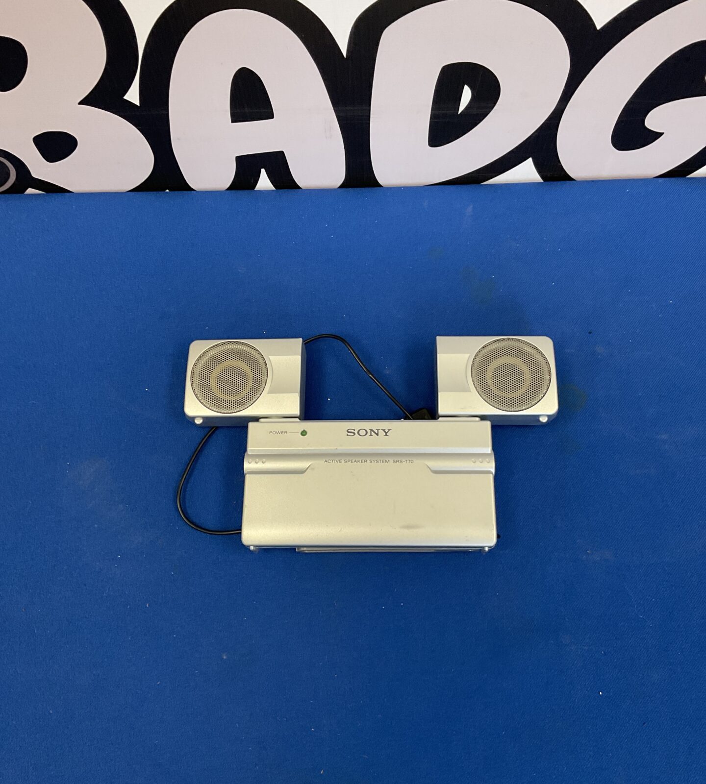White Sony SRS-T70 portable mini speaker system.