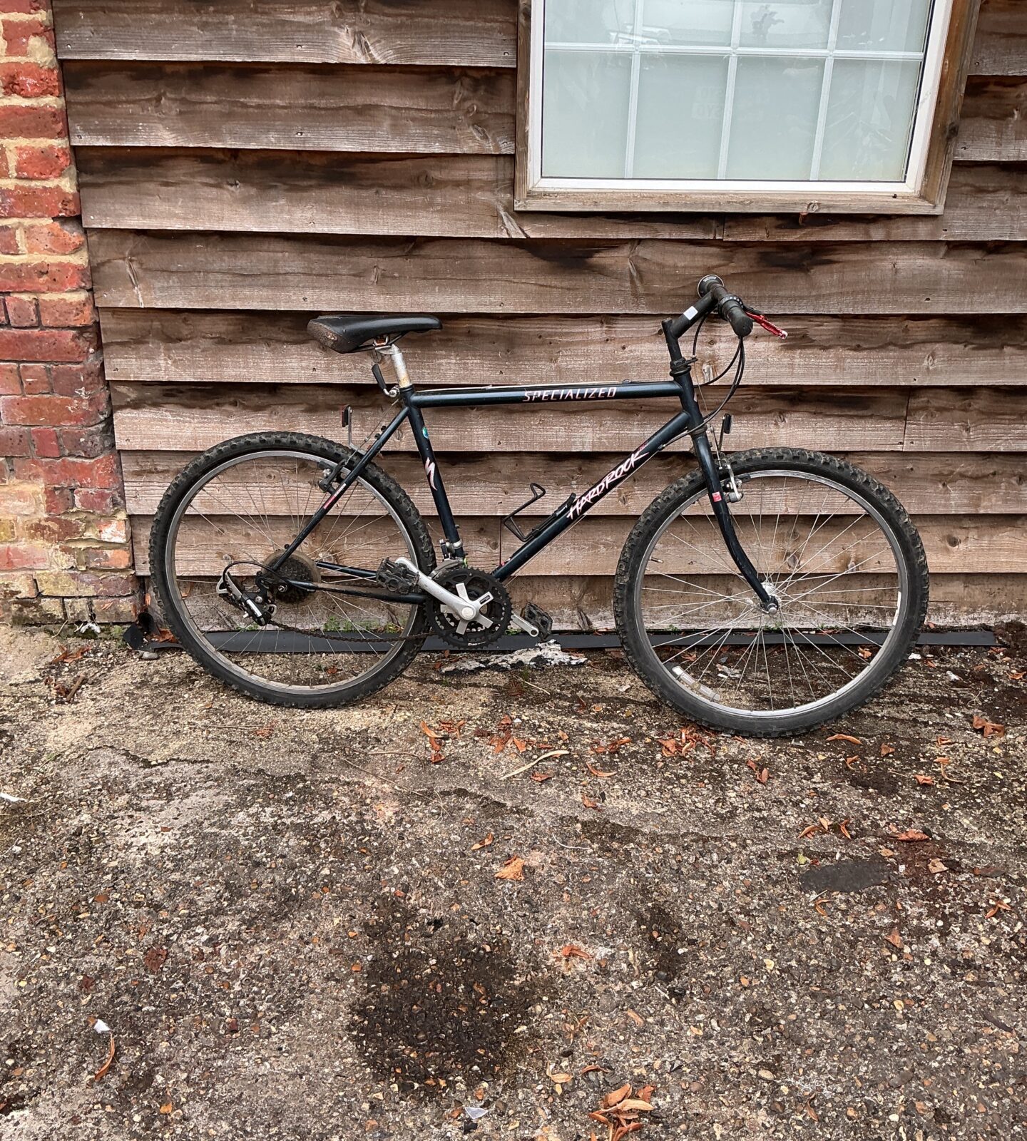 Vintage Specialized Rockhopper mountain bike in need of repair.