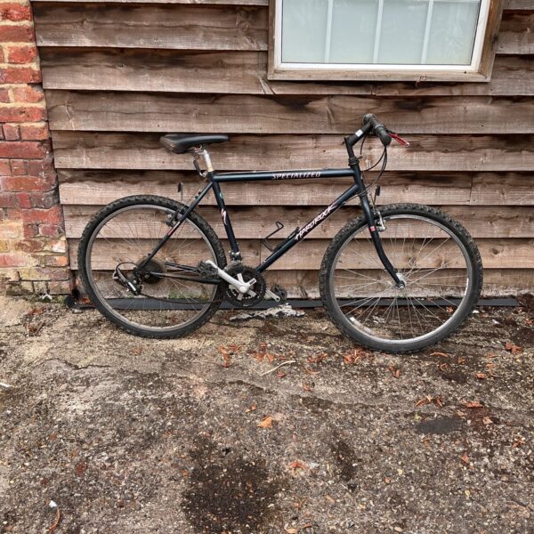 Vintage Specialized Rockhopper mountain bike in need of repair.
