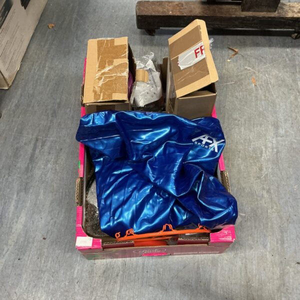 Blue protective pad within a sports equipment lot.