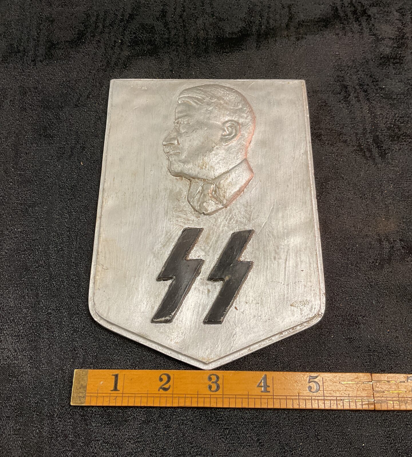 Rare SS ceramic shield with Hitler head and SS runes.
