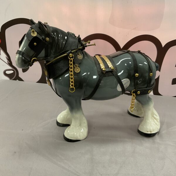 Detailed Staffordshire shire horse figurine, vintage pottery collectible.