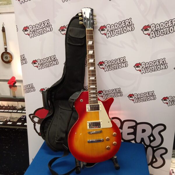 Sunburst Stagg electric guitar with hard case, musical instrument.