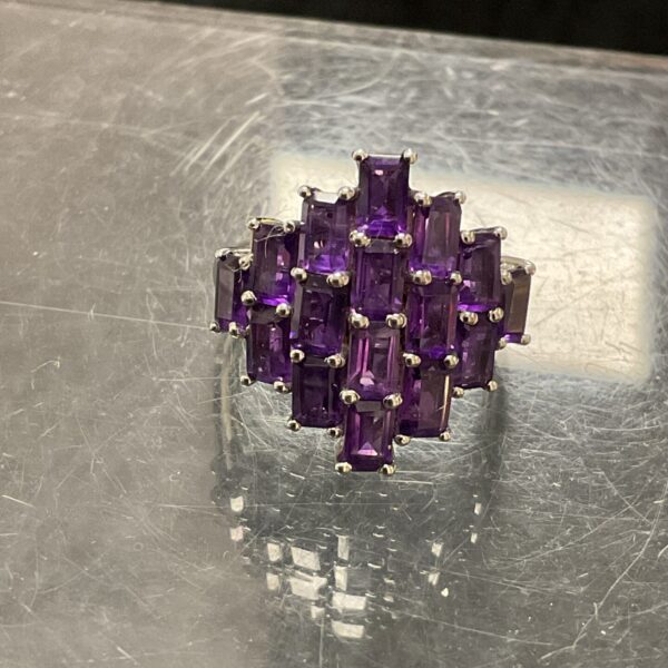 Close-up of a sterling silver amethyst cluster ring.