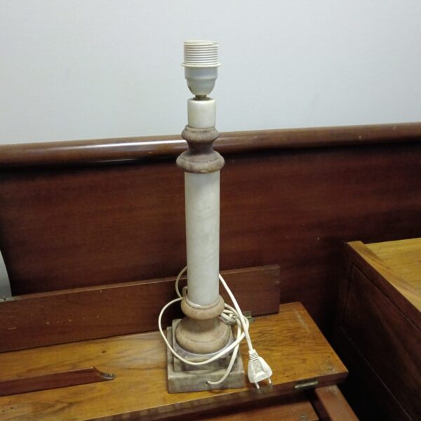 Vintage stone column table lamp with a unique design.