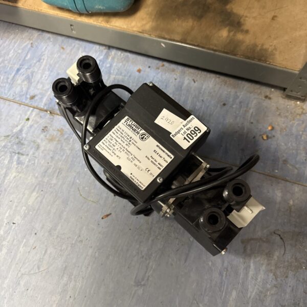Stuart Turner Showermate shower pump for boosting water pressure.