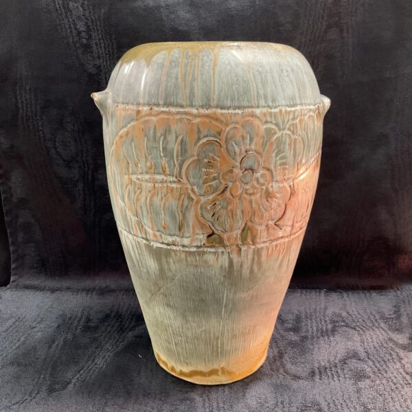 Textured studio pottery vase from Weston Super Mare, front view.