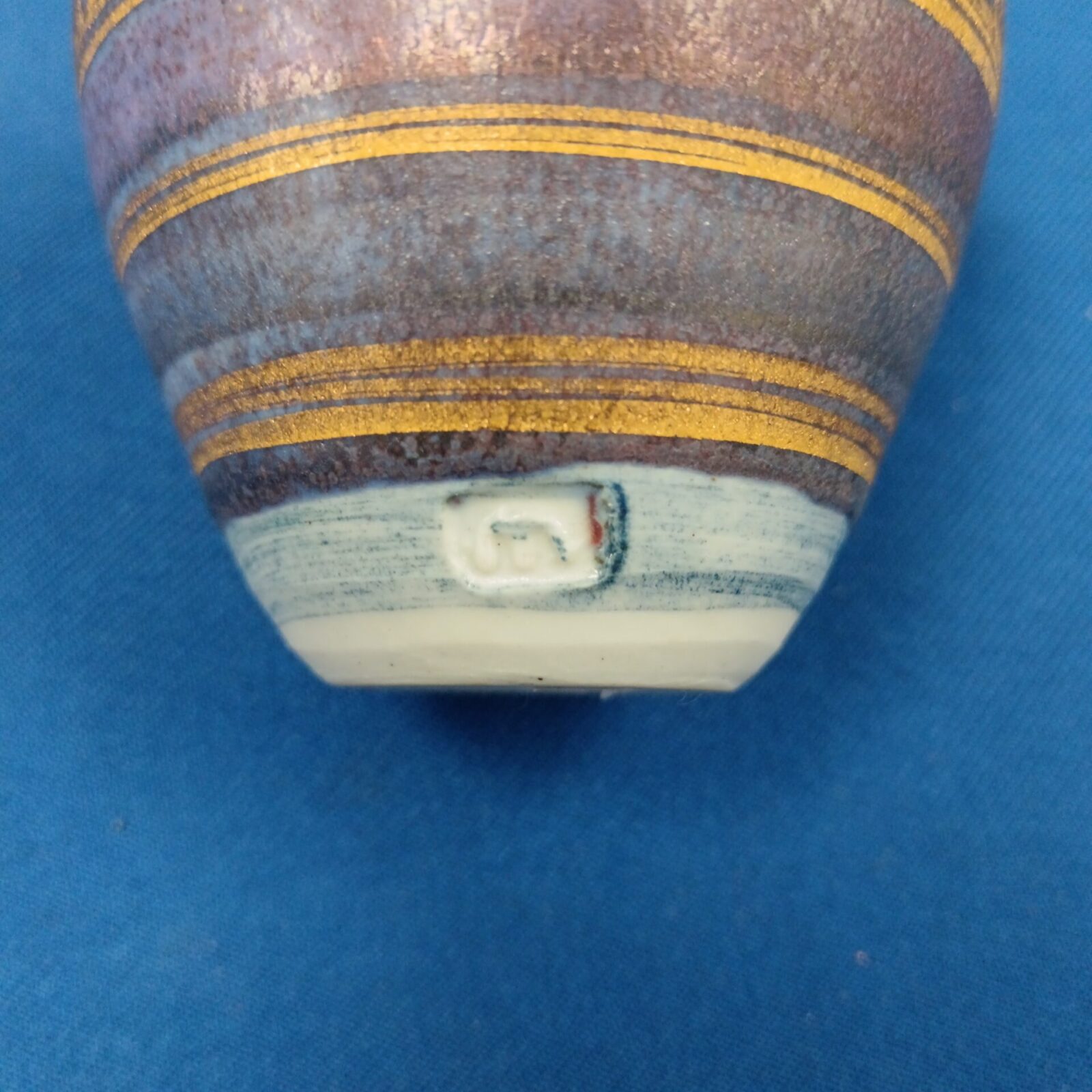 Side view of vintage studio pottery vase.