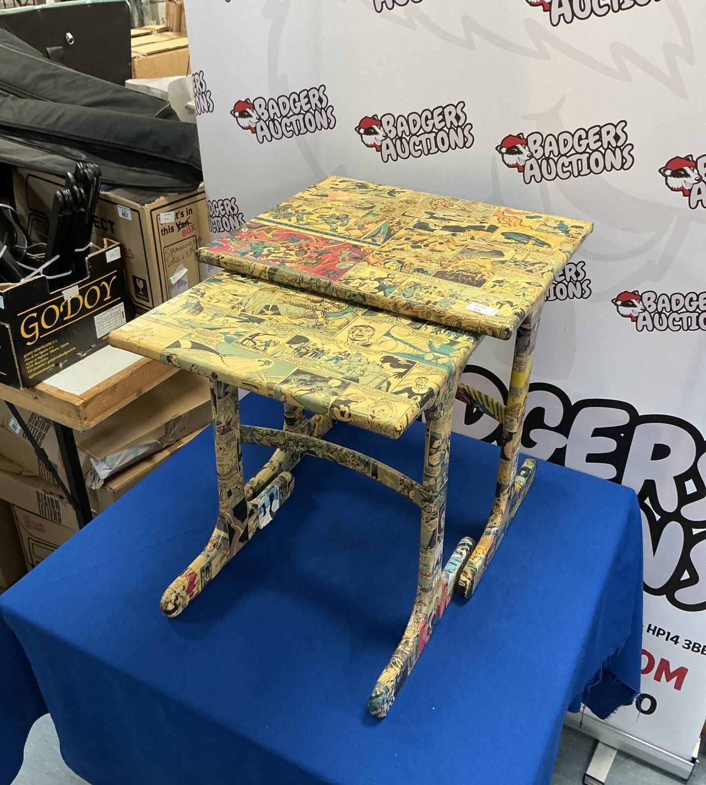 Colourful superhero table set with comic book designs.