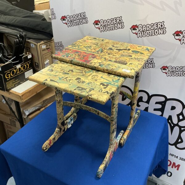 Colourful superhero table set with comic book designs.