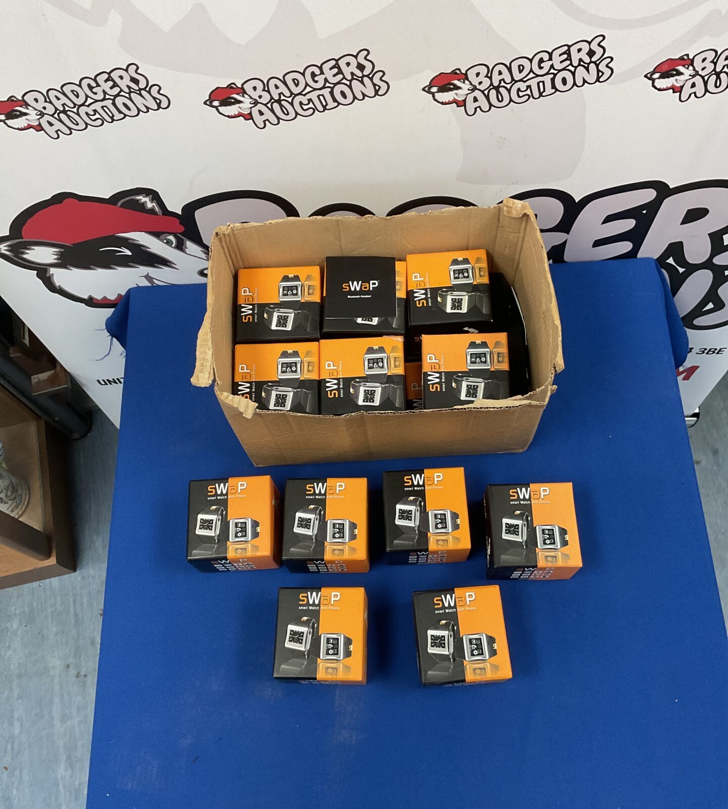 Lot of new Swap smartwatches in original packaging.