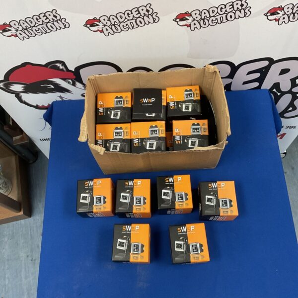 Lot of new Swap smartwatches in original packaging.
