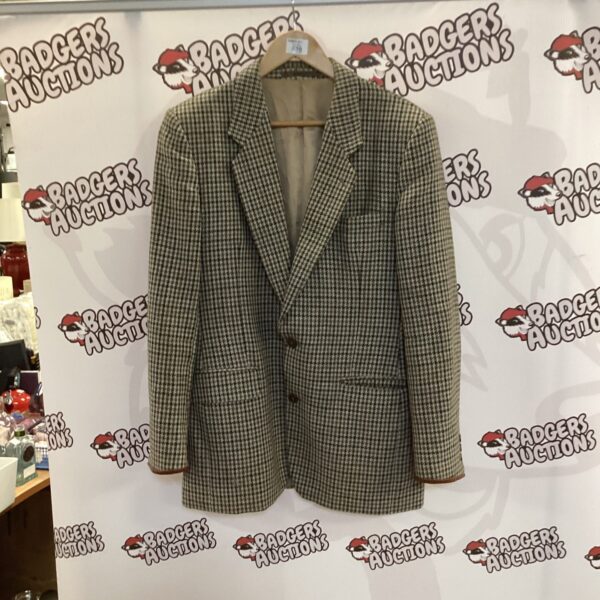 Vintage Swedish tweed blazer with herringbone pattern.
