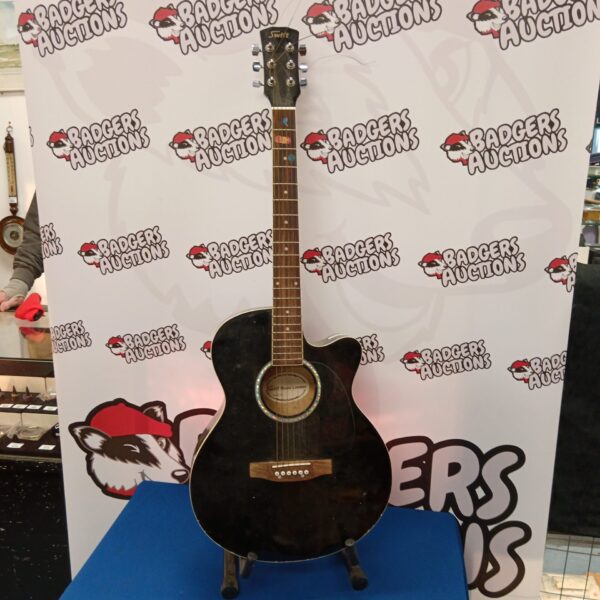 Vintage Swift London acoustic guitar in dark finish.