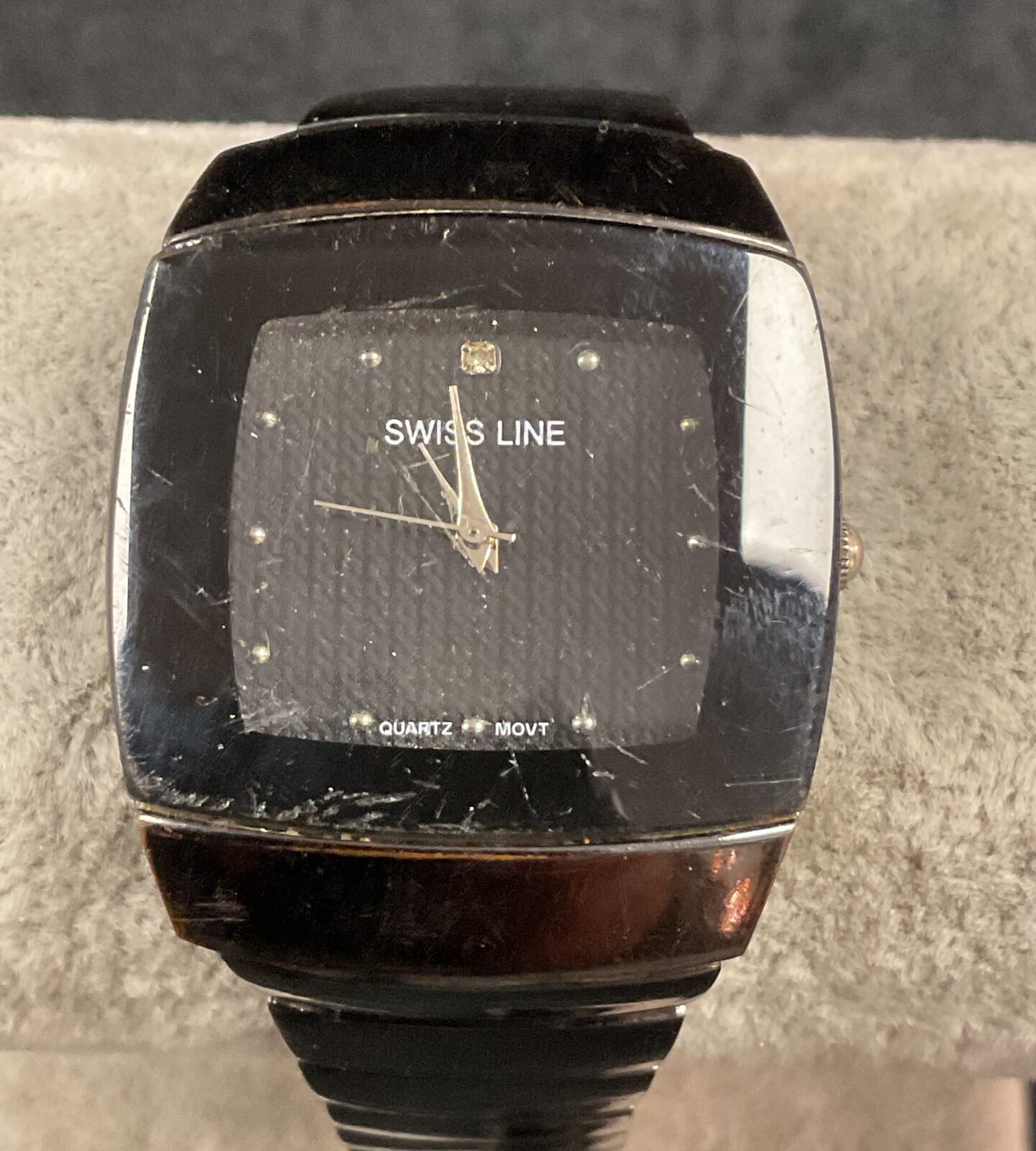 Front view of a vintage Swiss Line quartz wristwatch.