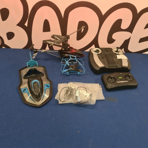 RC helicopter lot featuring Syma S100C and Airhogs Robocopter with remotes.