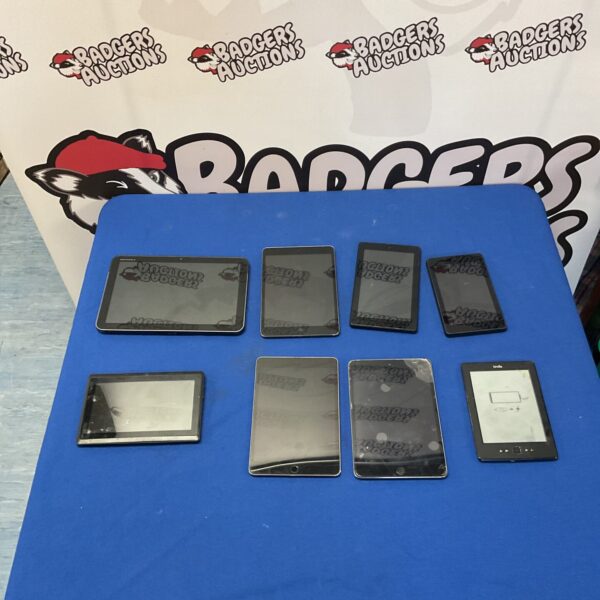 Mixed lot of eight tablets including iPads, Kindle, and Motorola.