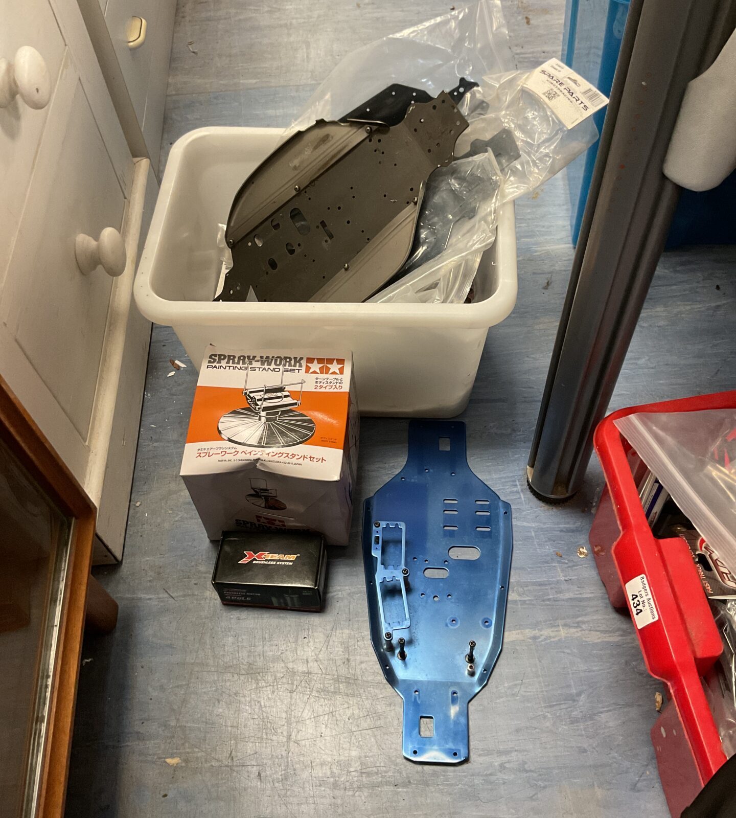 Tamiya RC car parts and accessories lot for hobbyists.