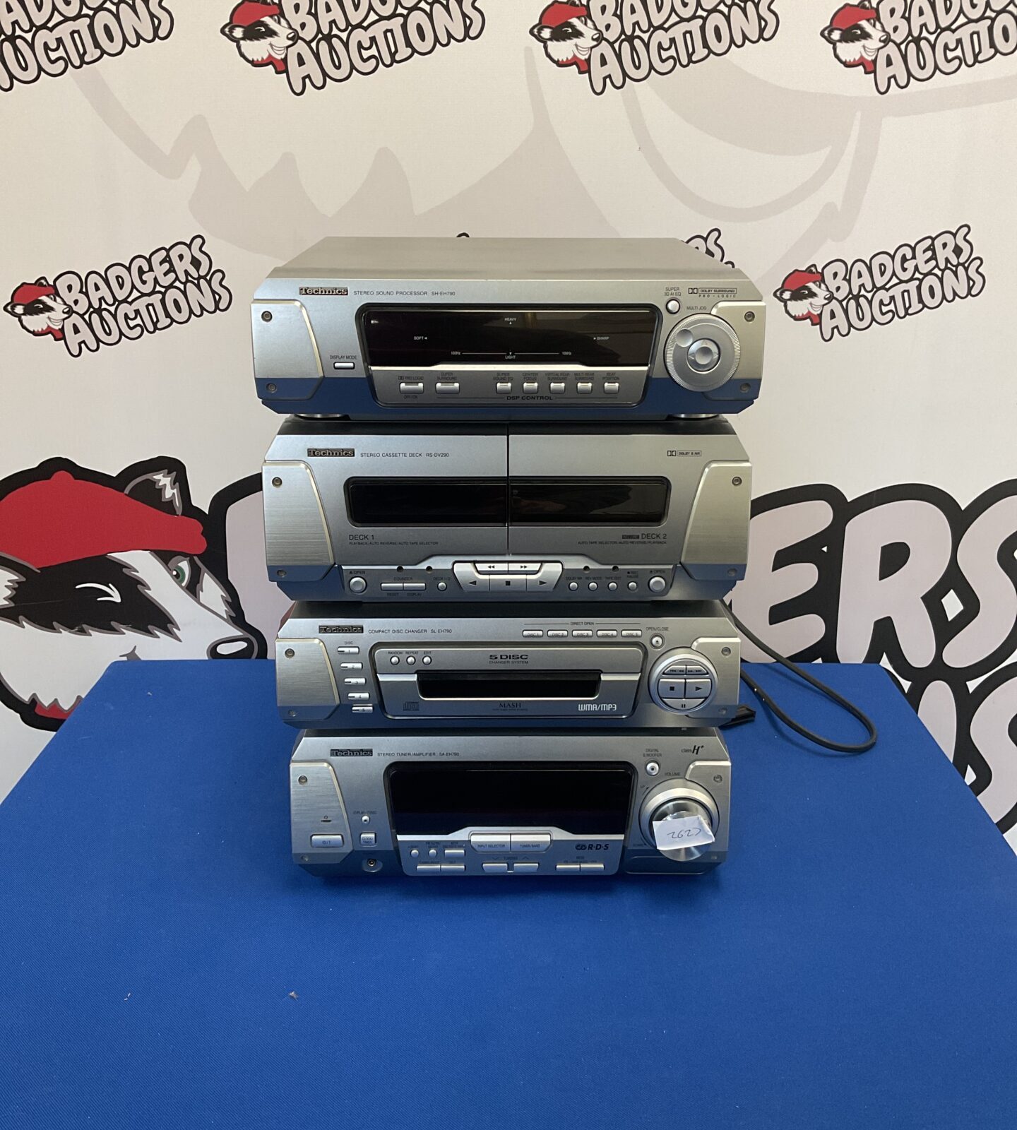 Vintage Technics HiFi system components including cassette deck and CD changer.